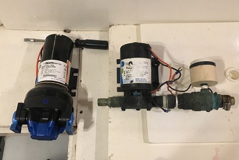 New salt water pump to replace the old one on the right